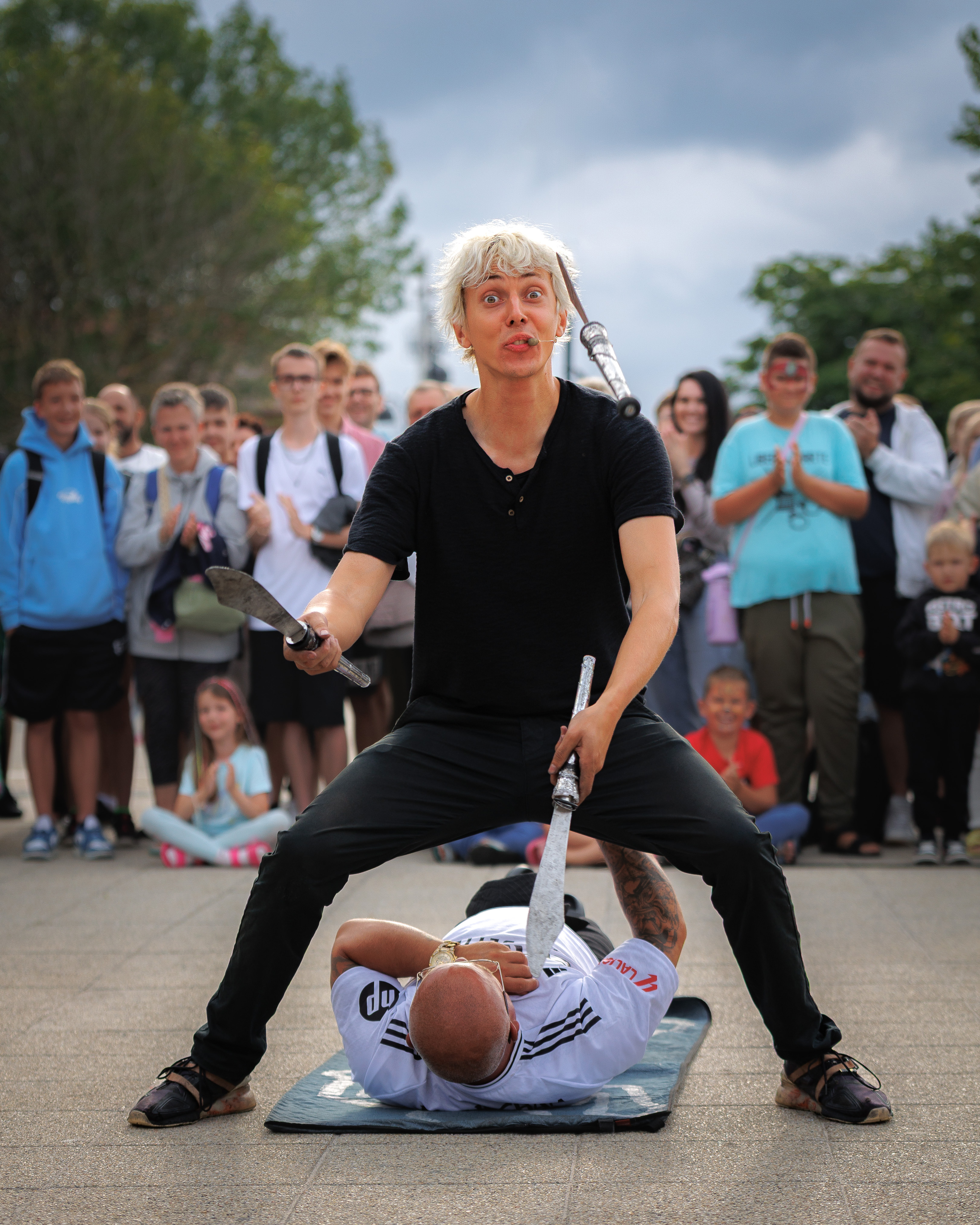Machete juggling performance